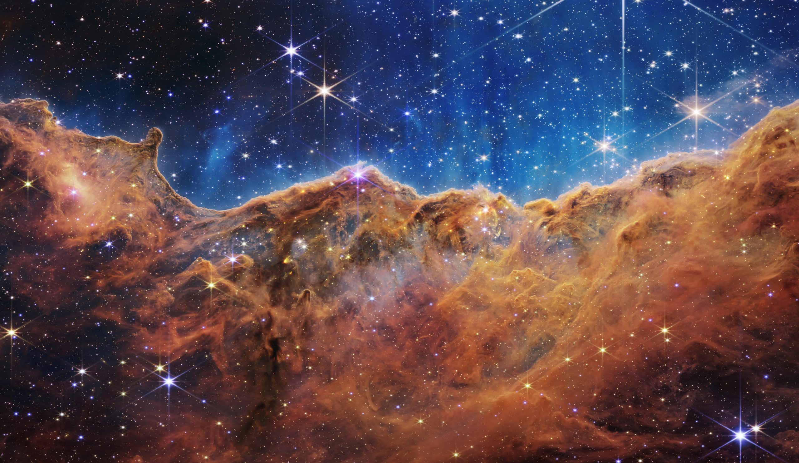 James Webb uzay teleskobundan çekilmiş, Carina Nebulası yıldız oluşumu.